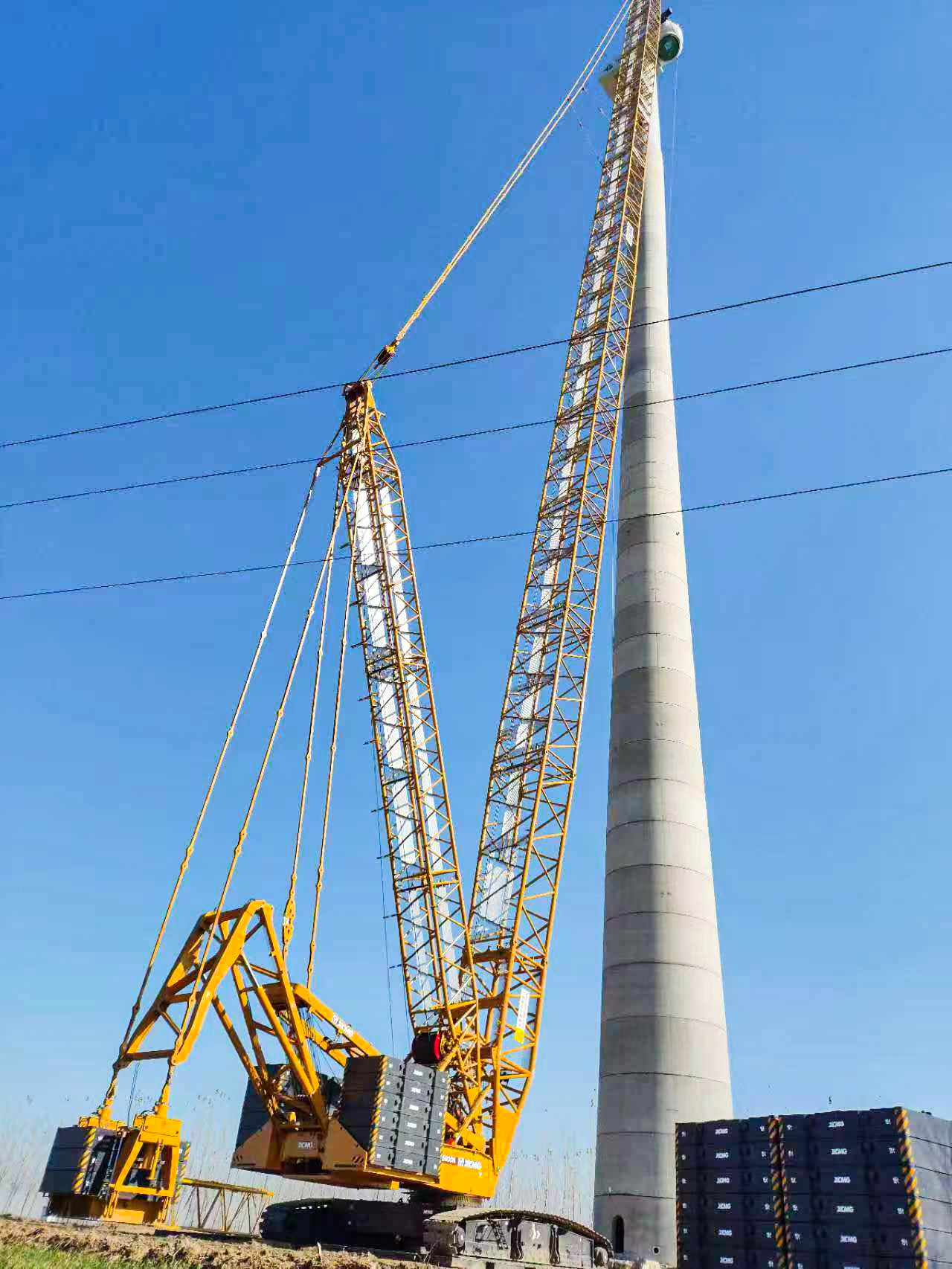 160米高空精准“搭积木”：和记娱乐XLC15000M分体吊装6.25兆瓦风机全纪录